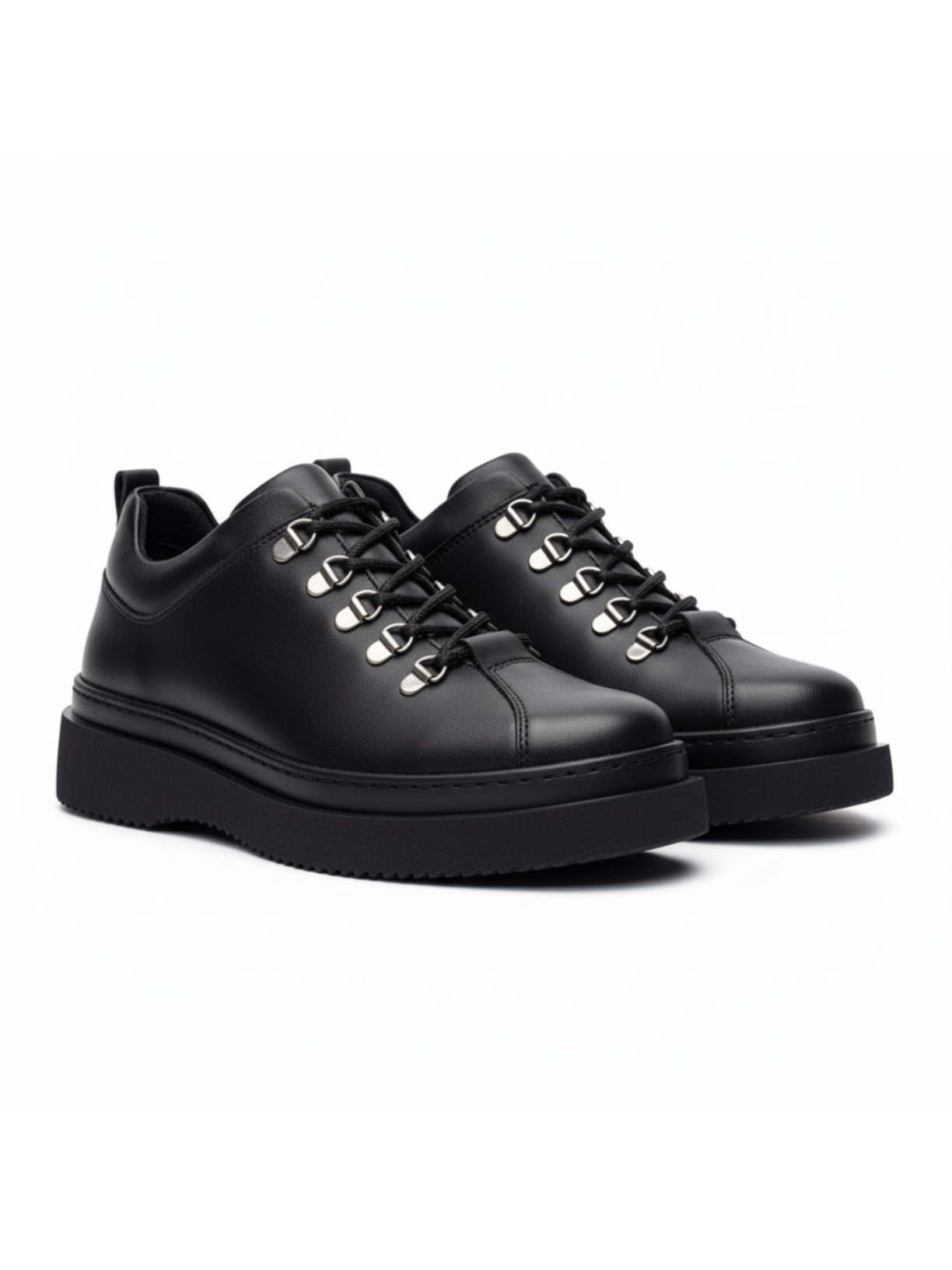 Atlas Shadow all-black sneaker with metal hiking eyelets by Apollo Moda, third angle